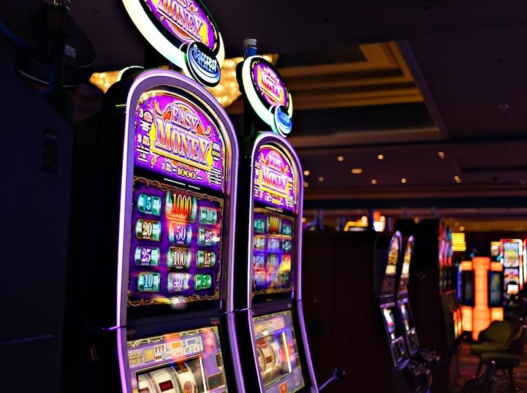 Two exquisite purple slot machines, a blend of beauty and entertainment