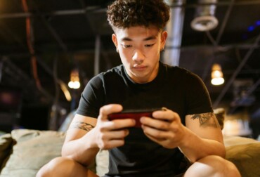Man Playing Mobile Game