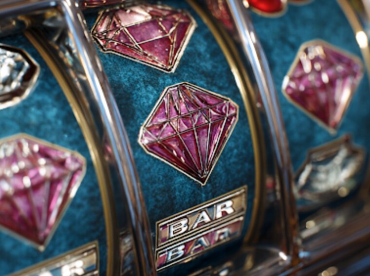 Close-up of a modern slot machine reel showing diamond symbols