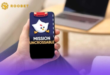 Person looking at Mission Uncrossable on phone
